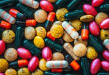 식단과 운동: 건강한 삶을 위한 필수 구성 요소 red and brown medication pill