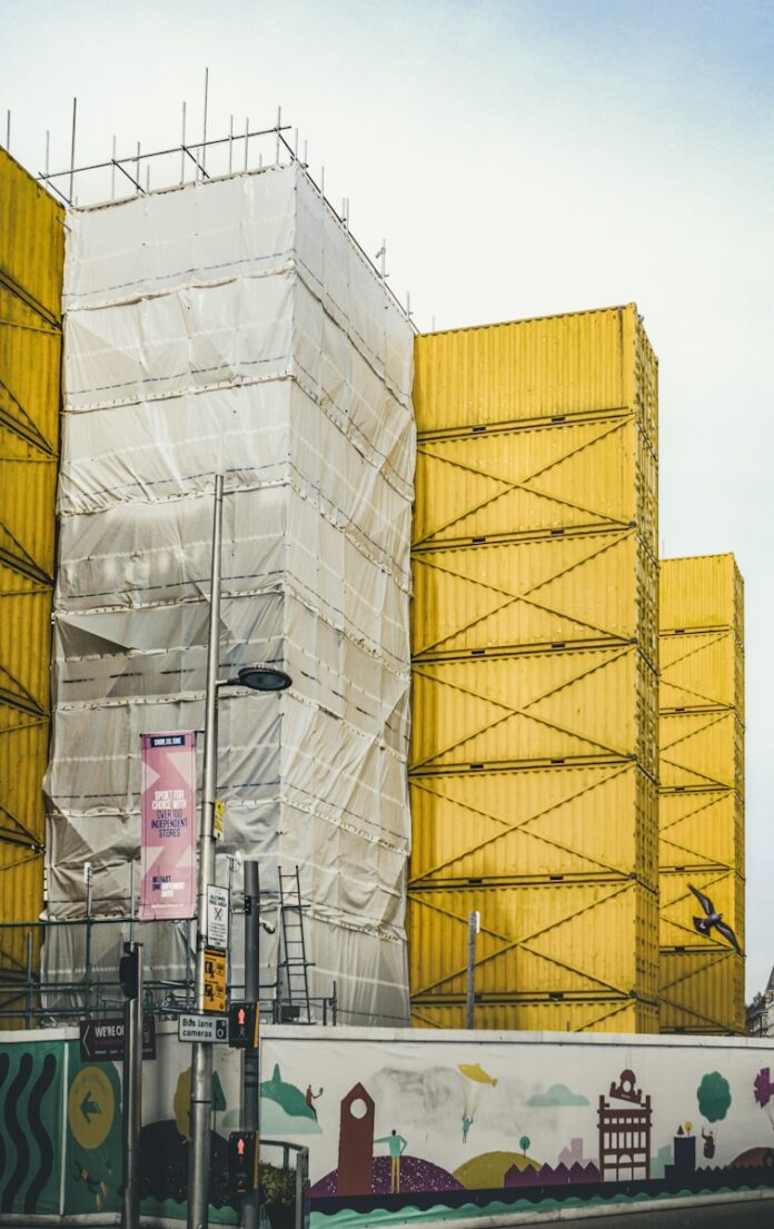 Photo by K. Mitch Hodge brown cardboard boxes on gray concrete floor