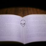 일상 속 정신건강 지키기, 작은 루틴이 큰 변화를 만든다 white book page on brown wooden table